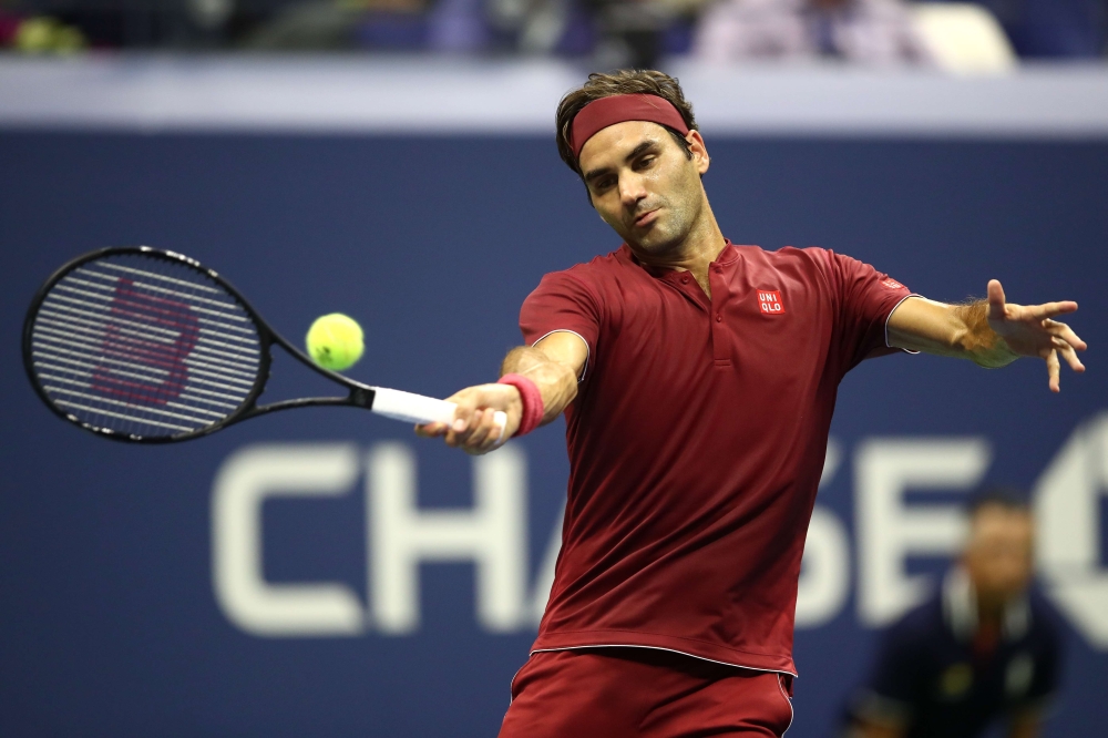 Roger Federer of Switzerland returns the ball during the men's singles fourth round match against John Milman of Australia on Day Eight of the 2018 US Open at the USTA Billie Jean King National Tennis Center on September 3, 2018 in the Flushing neighborho