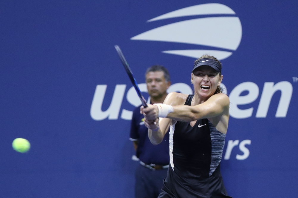 Maria Sharapova of Russia competes against Carla Suarez Navarro (not seen) of Spain during US Open 2018 tournament in New York, United States on September 3, 2018. ( Mohammed Elshamy - Anadolu Agency )