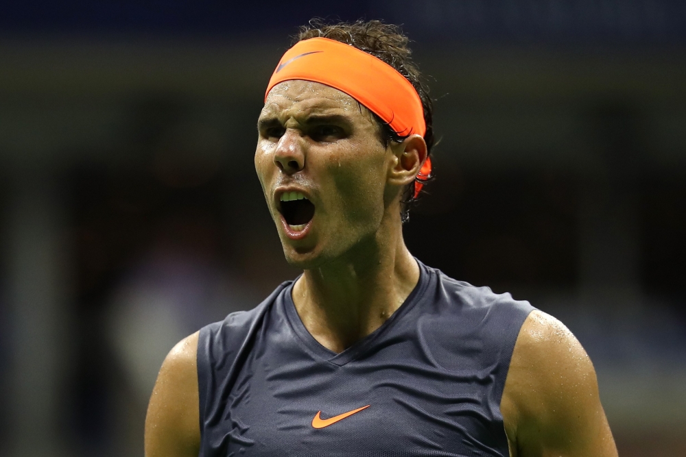 Rafael Nadal of Spain reacts during the men's singles quarter-final match against Dominic Thiem of Austria on Day Nine of the 2018 US Open at the USTA Billie Jean King National Tennis Center on September 4, 2018 in the Flushing neighborhood of the Queens 