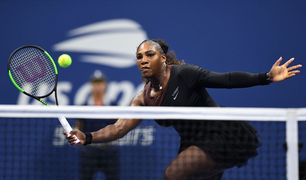 US Serena Williams hits a return to Czech Republic's Karolina Pliskova during their Women's Singles Quarter-Finals match at the 2018 US Open at the USTA Billie Jean King National Tennis Center in New York on September 4, 2018. / AFP / Don EMMERT