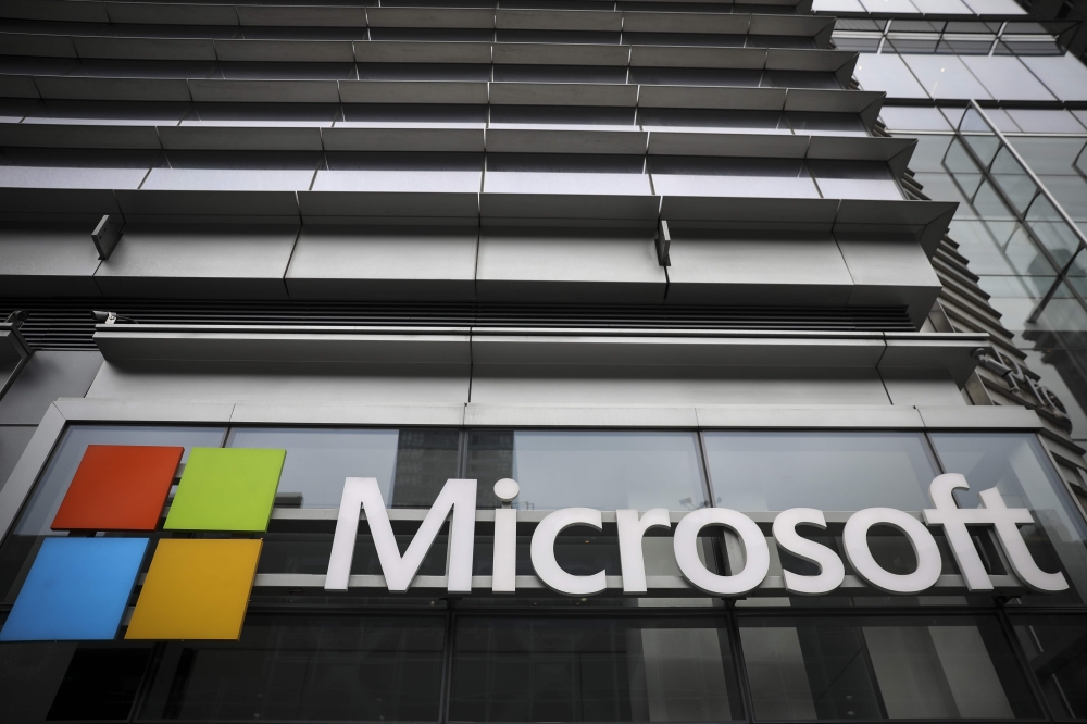 FILE PHOTO: In this file photo taken on June 4, 2018 shows the Microsoft logo displayed outside the Microsoft Technology Center near Times Square in New York City. AFP / Drew Angerer

