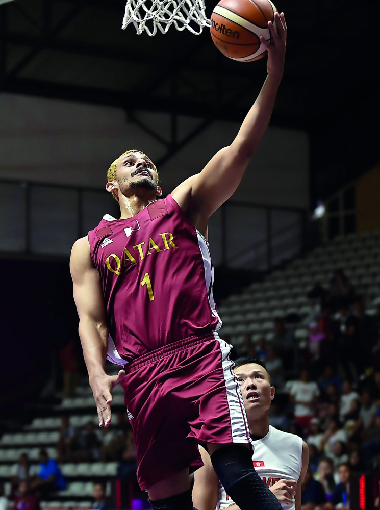 Qatar’s Mohamed Hassan Mohamed goes for the basket against Hong Kong in the Group C game during the 2018 Asian Games in Jakarta in this August 14 file photo.
