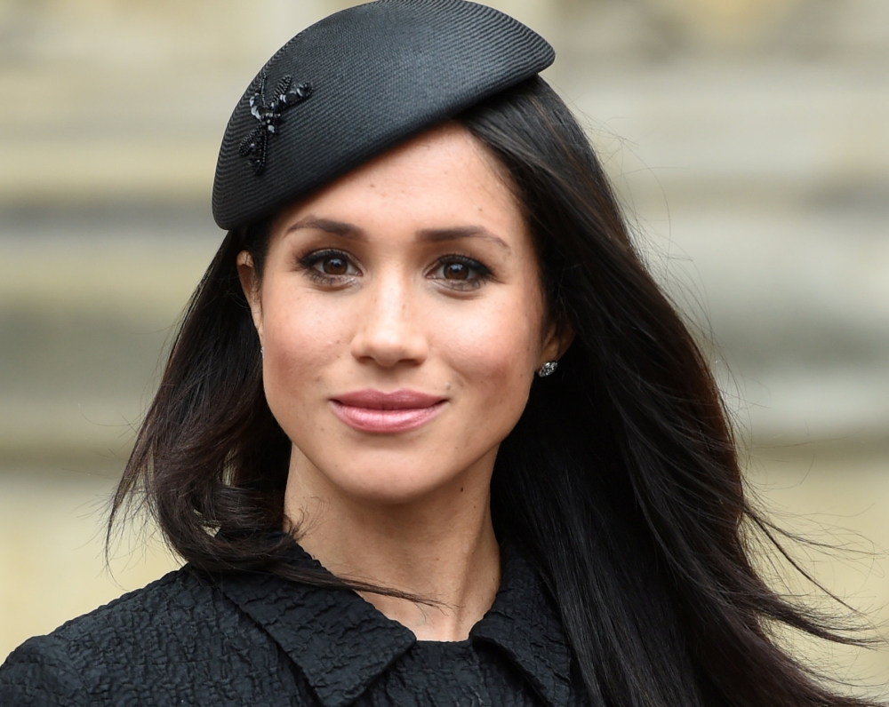 File photo of Meghan Markle, the fiancee of Britain's Prince Harry, attends a Service of Thanksgiving and Commemoration on ANZAC Day at Westminster Abbey in London, Britain, April 25, 2018. Eddie Mulholland/Pool via Reuters/File Photo