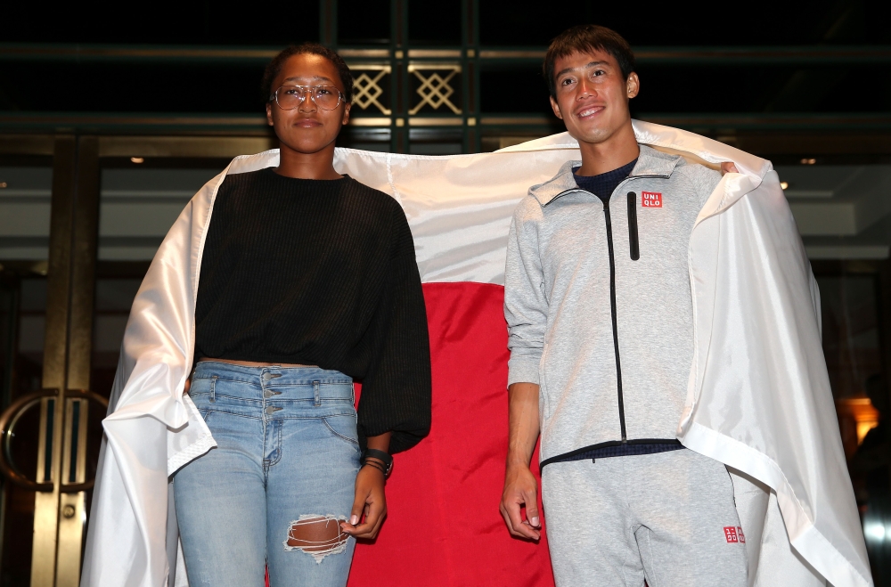 Men's singles semi-finalist Kei Nishikori of Japan and women's singles semi-finalist Naomi Osaka of Japan pose for a portrait outside The Kitano Hotel following their quarter-final matches on day 10 of the 2018 US Open at The Kitano Hotel on September 5, 