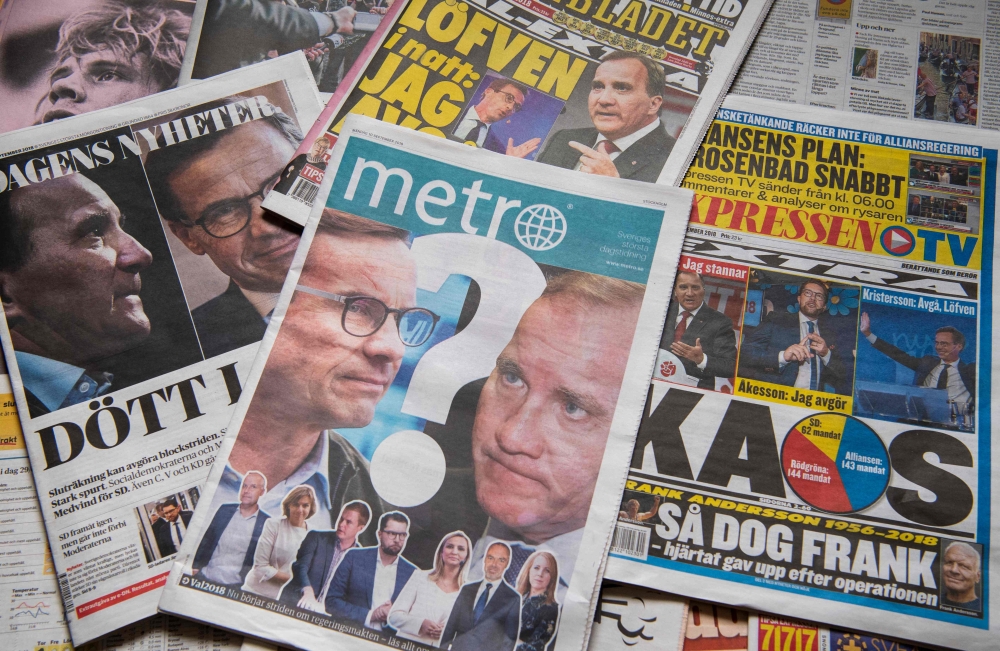 A selection of front pages of Swedish newspapers in Stockholm a day after the general elections.  AFP / Jonathan NACKSTRAND
