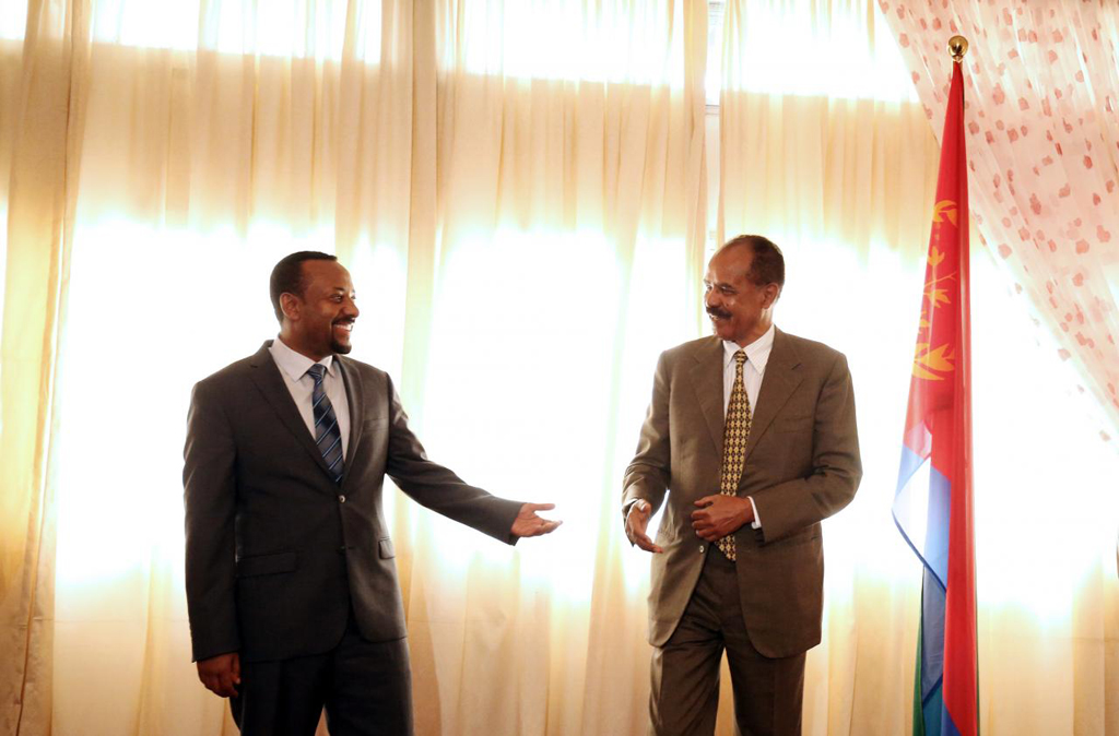 File photo of Eritrea's President, Isaias Afwerki talks to Ethiopia's Prime Minister, Abiy Ahmed during the Inauguration ceremony marking the reopening of the Eritrean Embassy in Addis Ababa, Ethiopia July 16, 2018. REUTERS/Tiksa Negeri/File photo