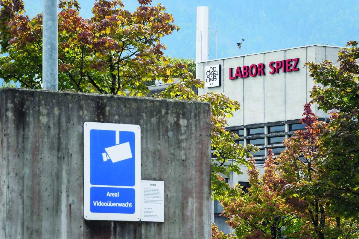 A sign warning of CCTV area controlled is seen next to the Spiez Laboratory, Swiss Federal Institute for NBC-Protection (nuclear, biological, chemical), on September 14, 2018 in Spiez, 40km from the capital Bern as Swiss newspapers reported that two Russi