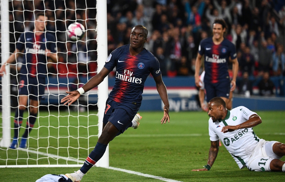 Paris Saint-Germain's French forward Moussa Diaby (L) celebrates after scoring a goal during the French L1 football match between Paris Saint-Germain (PSG) and Saint-Etienne (ASSE) at the Parc des Princes stadium in Paris on September 14, 2018. (AFP / FRA