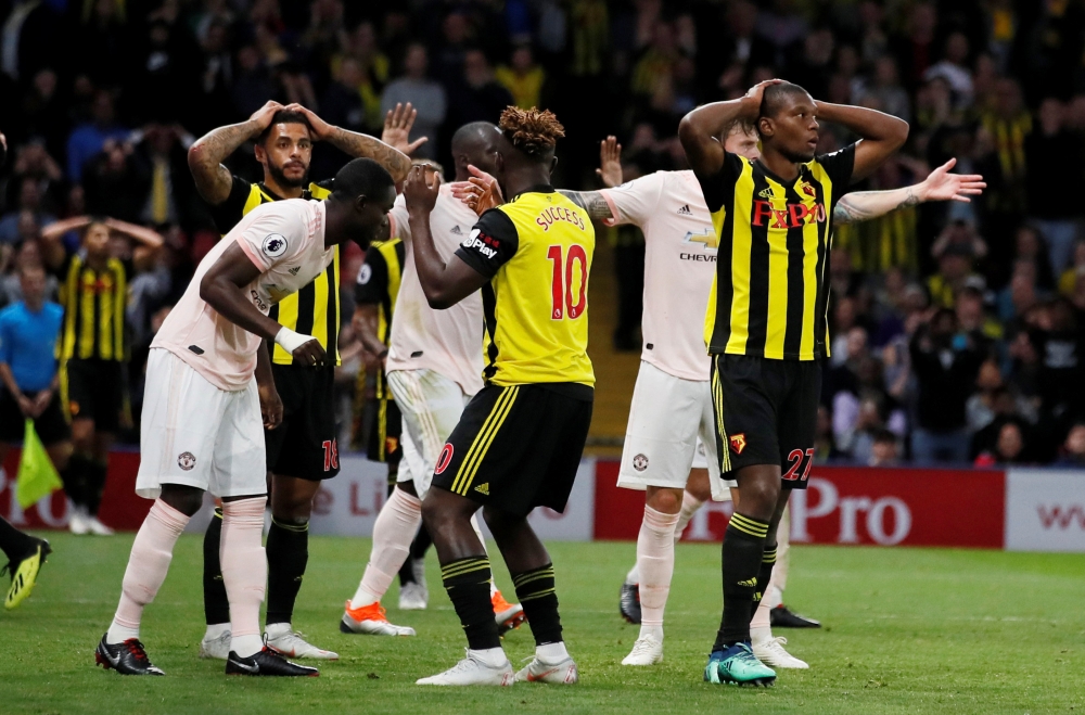 Watford's Christian Kabasele and team mates react after a missed chance REUTERS/David Klein 