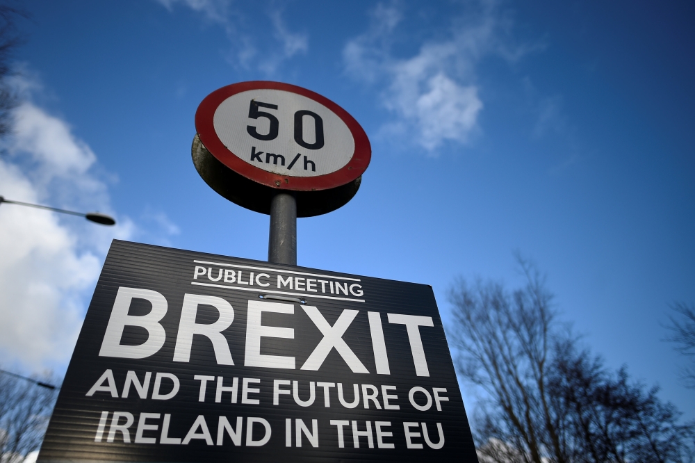 A Brexit sign is seen between Donegal in the Republic of Ireland and Londonderry in Northern Ireland at the border village of Muff, Ireland, February 1, 2018. Picture taken February 1, 2018. REUTERS/Clodagh Kilcoyne