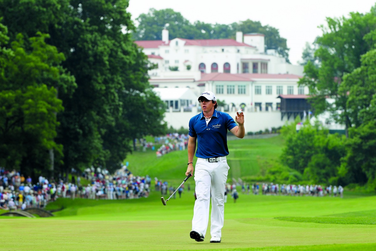  In this file photo taken on June 16, 2011 Rory McIlroy of Northern Ireland waves to the gallery on the 11th green during the first round of the 111th US Open at Congressional Country Club in Bethesda, Maryland. AFP / Getty Images North America / Jamie Sq
