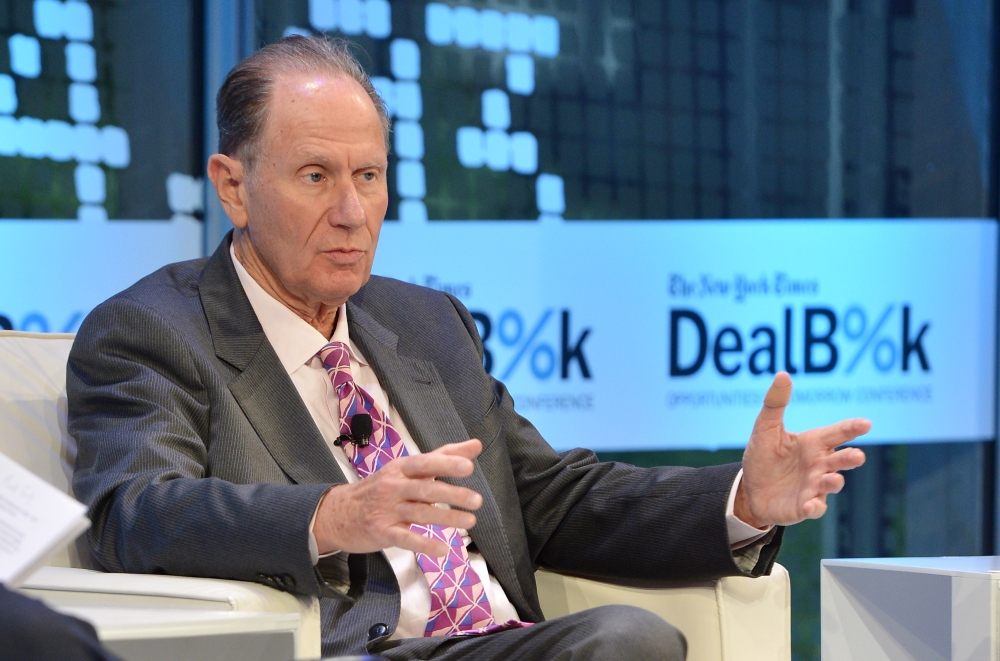 FILE PHOTO:  This file photo taken on November 12, 2013 shows founding partner at TPG Capital David Bonderman participating in a discussion at the New York Times 2013 DealBook Conference in New York.   AFP / Larry Busacca