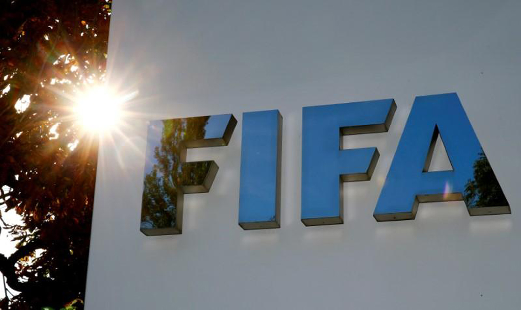 File photo of the logo of FIFA is seen in front of its headquarters in Zurich, Switzerland September 26, 2017. REUTERS/Arnd Wiegmann
