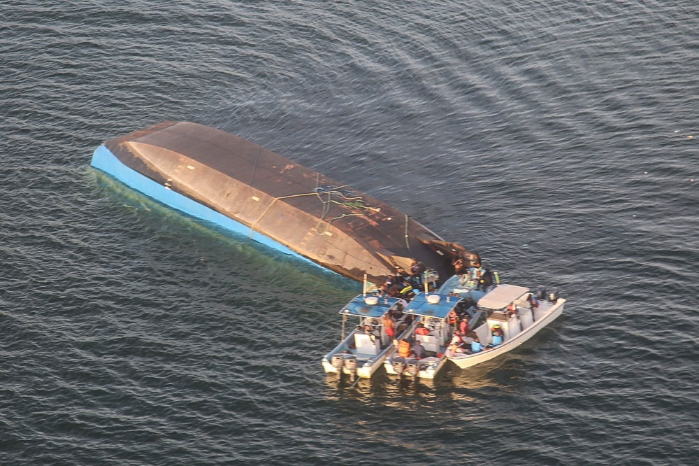 An aerial image shows the capsized ferry MV Nyerere which killed 131 people in Lake Victoria, Tanzania, on September 21, 2018.  AFP / Stringer