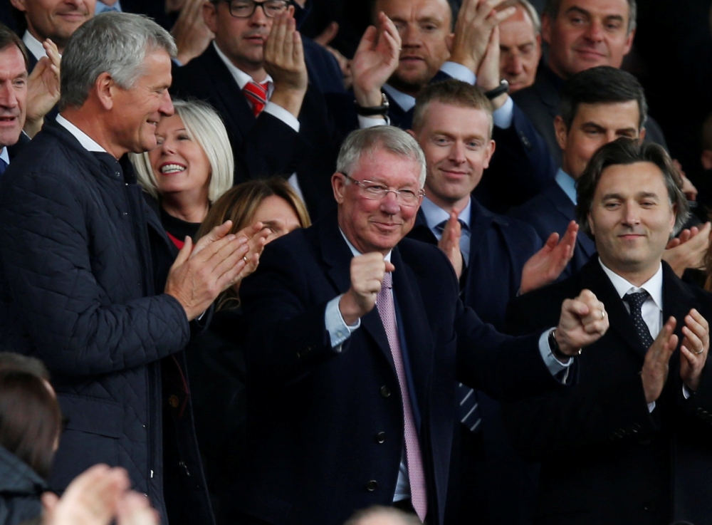 Sir Alex Ferguson and FIFA Council vice-president David Gill in the stands before the match REUTERS/Andrew Yates 