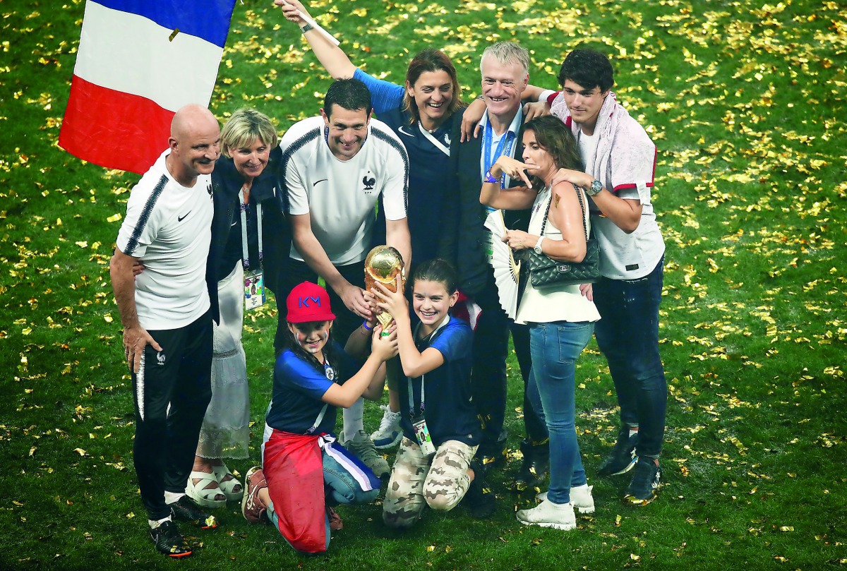 France coach Didier Deschamps (third right)  celebrates after winning the World Cup with his family in Moscow in this July 15, 2018 file photo. 
