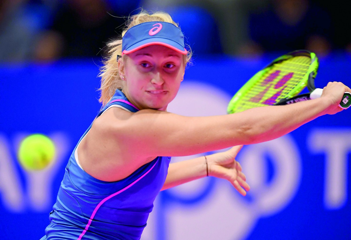 Daria Gavrilova of Australia hits a return against Karolina Pliskova of the Czech Republic during their women's singles second round match at the Pan Pacific Open tennis tournament in Tokyo on September 19, 2018.  AFP / Toshifumi Kitamura
 