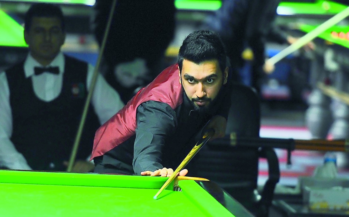 A Qatari player in action in the Asian 6Reds Championship at the Qatar Billiards and Snooker Federation hall in Doha yesterday.
