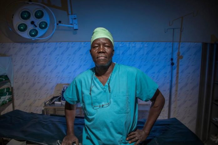 South Sudanese surgeon, Evan Atar Adaha, 52, and winner of the Nansen Refugee Award, in an operating theatre at the Maban Hospital in the town of Bunj, Maban County, South Sudan on May 7, 2018. Courtesy: UNHCR / Will Swanson