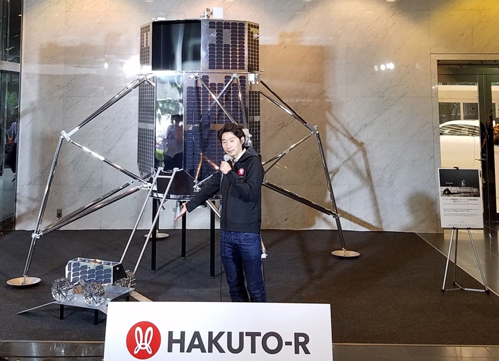 Takeshi Hakamada, CEO of Japanese firm ispace, holds a press conference to explain about the ipsace lunar lander and rover of its lunar programme HAKUTO-R in Tokyo on September 26, 2018. AFP / Natsuko Fukue
