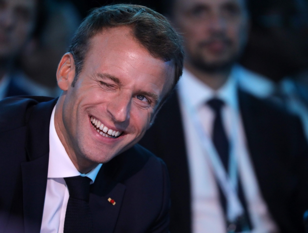 French President Emmanuel Macron listens during the One Planet Summit at the Plaza Hotel on the sidelines of the United Nations General Assembly in New York on September 26, 2018. / AFP / Ludovic MARIN