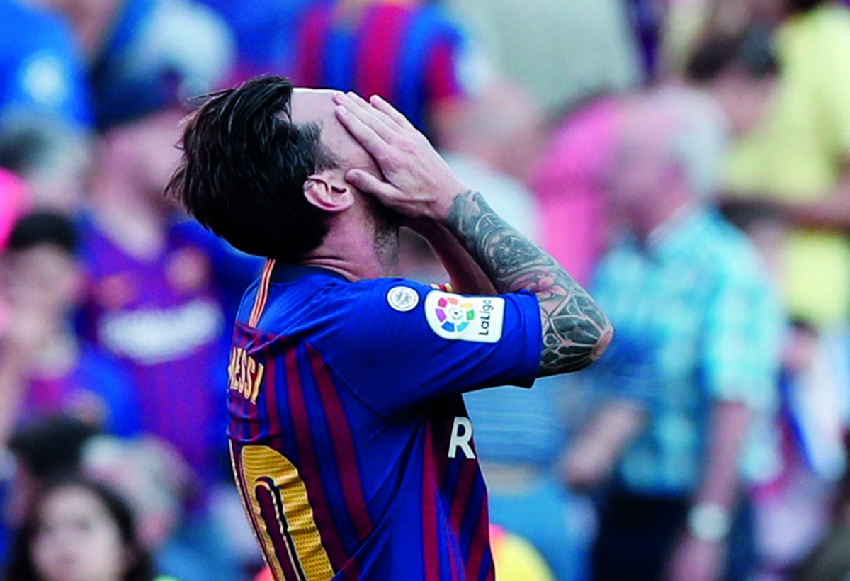 Barcelona's Lionel Messi reacts after the match. Reuters/Albert Gea 
