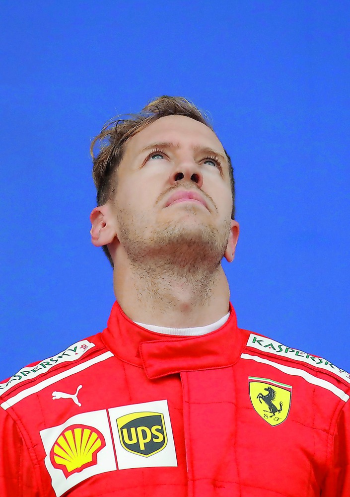  Third placed Ferrari's Sebastian Vettel. Reuters/Maxim Shemetov 