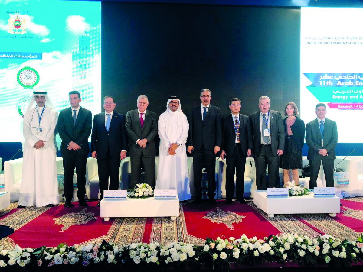 H E Dr Mohammed bin Saleh Al Sada (fifth left), Minister of Energy and Industry, with other officials at the four-day Arab Energy Conference being held in Marrakech, Morocco, yesterday.