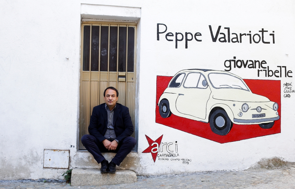 The mayor of Riace, Domenico Lucano, poses for a photograph in Riace November 23, 2013. Reuters/Max Rossi