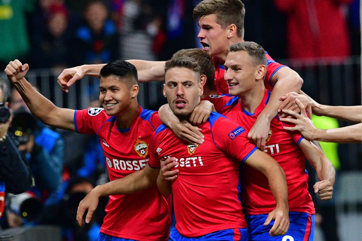 CSKA Moscow’s Croatian midfielder Nikola Vlasic (centre) celebrates with team-mates after scoring goal against Real Madrid CF in Moscow, yesterday. 