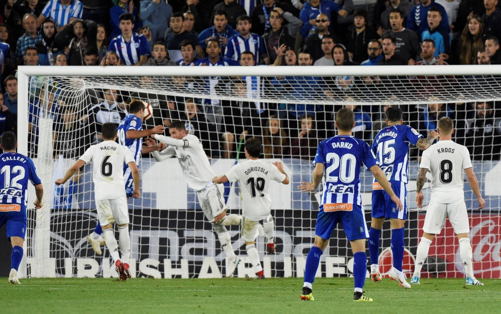 Alaves' Manu Garcia scores their first goal REUTERS/Vincent West
