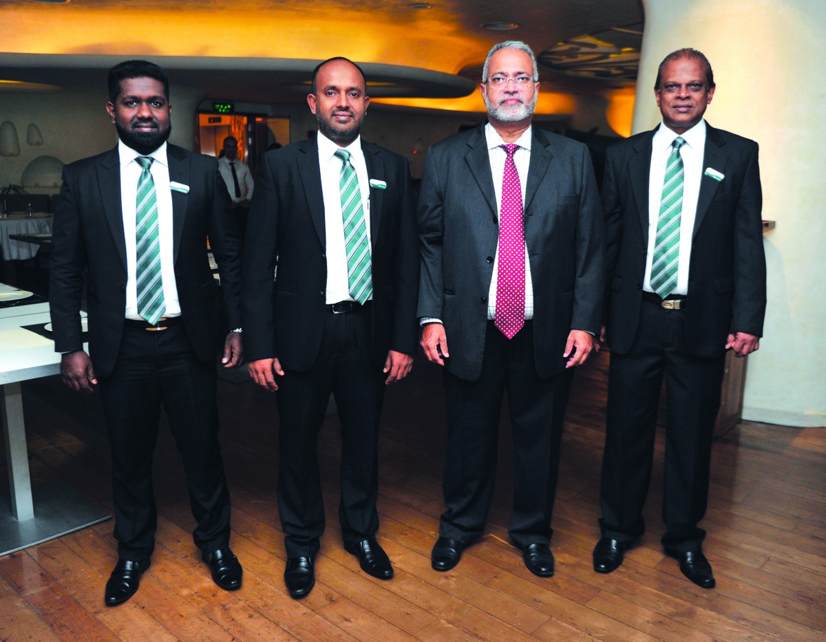 Siddeeque Akbar (second left), Vice President- Retail Banking and Marketing, Aman Bank, with M M Naina Marikar (second right), Head of Remittance Business, Aman Bank, and other officials in Doha. Pic: Abdul Basit/The Peninsula