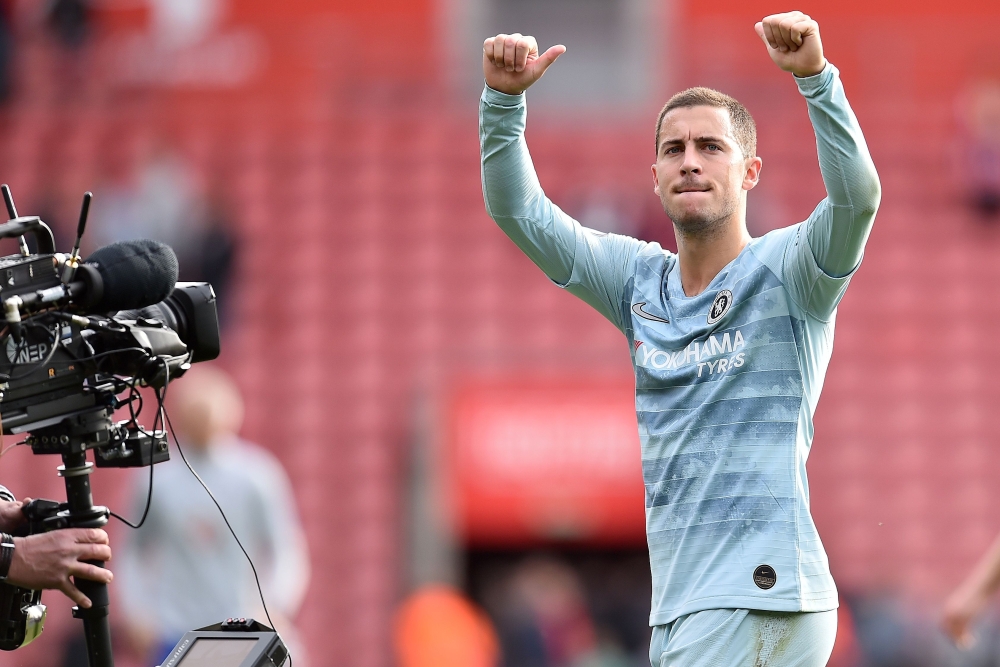 A television broadcast camera films as Chelsea's Belgian midfielder Eden Hazard applauds the fans following the English Premier League football match between Southampton and Chelsea at St Mary's Stadium in Southampton, southern England on October 7, 2018.