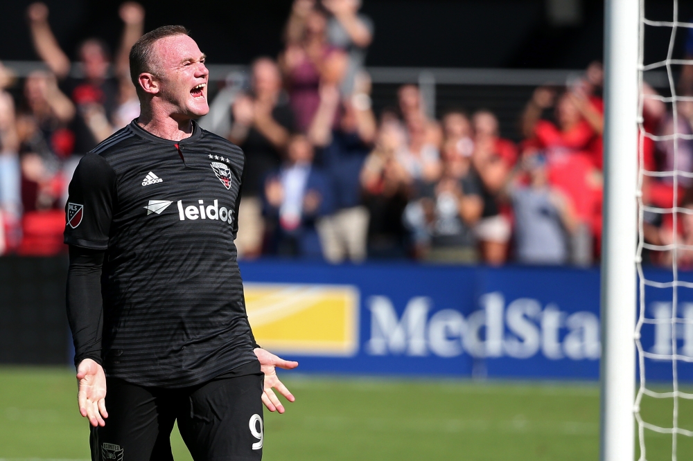 D.C. United forward Wayne Rooney (9) celebrates after scoring the go-ahead goal on a penalty kick against Chicago Fire in the second half at Audi Field. United won 2-1. Geoff Burke-USA TODAY Sports