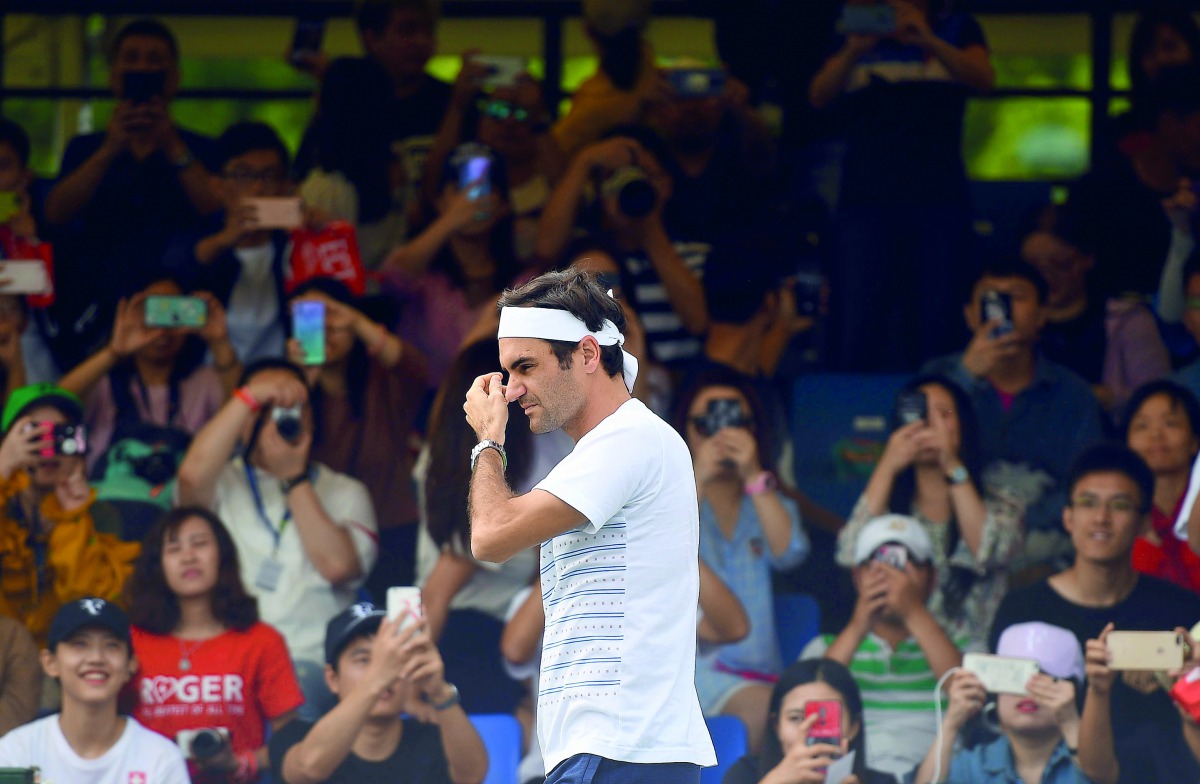 Roger Federer of Switzerland arrives for a training session at the Shanghai Masters tennis tournament on October 8, 2018. AFP / Johannes Eisele
