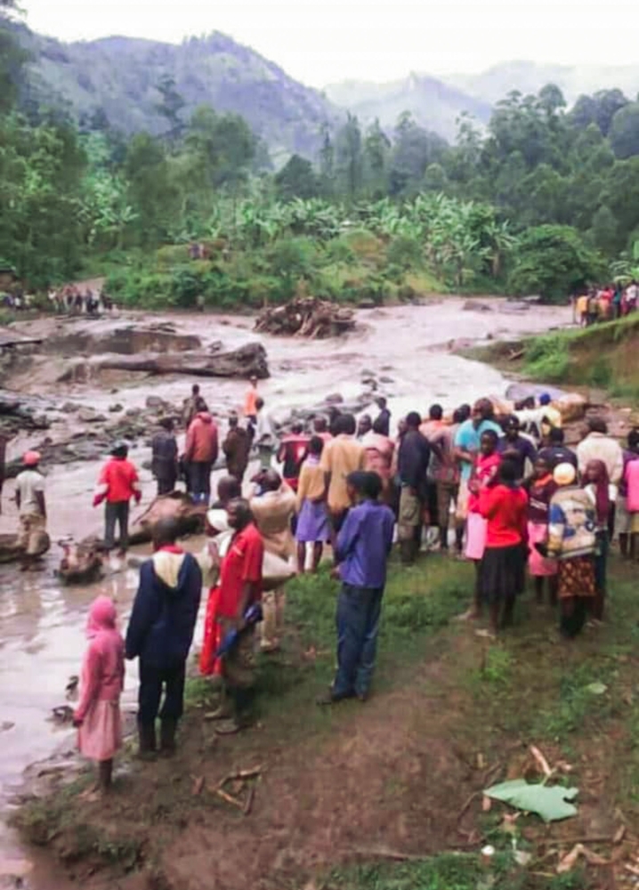 A handout photo released by Uganda Red Cross on October 11, 2018, reportedly shows the damage after a river burst its banks in the eastern town of Bukalasi, in Uganda's Bududa district. 