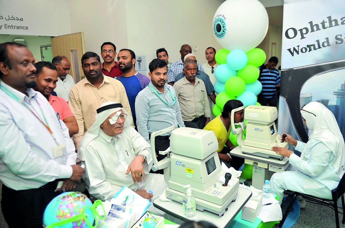 People undergoing eye tests during an awareness campaign held by Hamad Medical Corporation to mark the World Sight Day, yesterday. 
Pic by Abdul Basit / The Peninsula