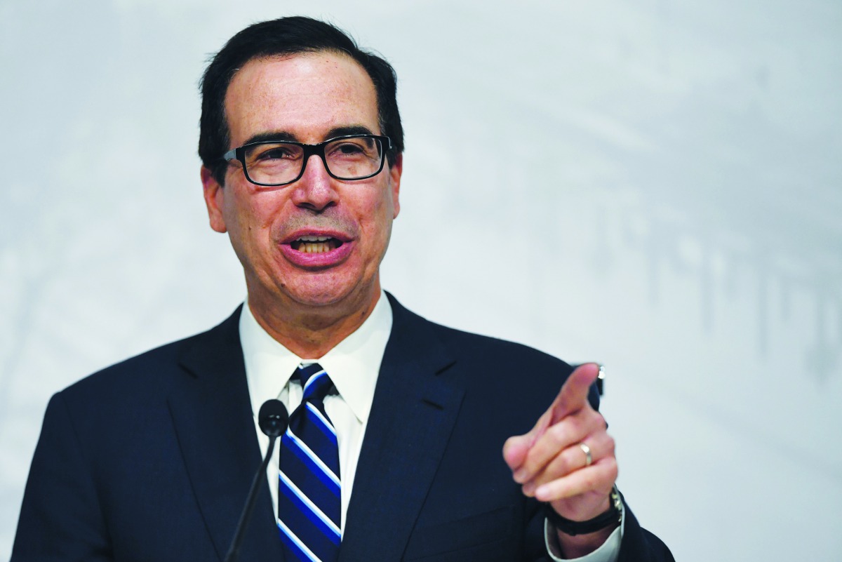 In this file photo taken on July 22, 2018, US Secretary of the Treasury Steven Mnuchin speaks during a press conference in Buenos Aires at the end of the G20 Finance Ministers and Central Bank Governors meeting.  AFP / Eitan Abramovich


