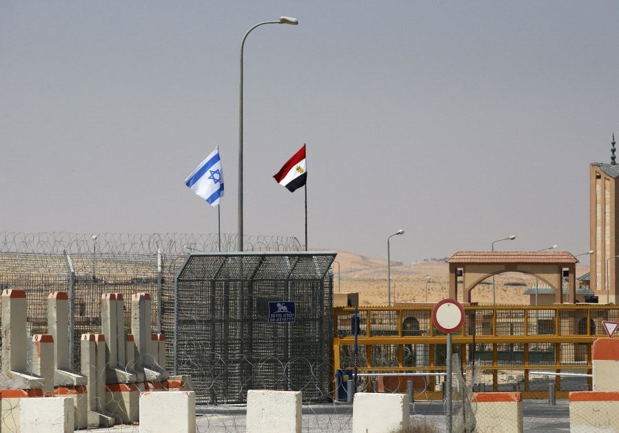 Israeli, Egyptian flags flutter at the Nitzana crossing along Israeli border with Sinai desert of Egypt. (Reuters) 