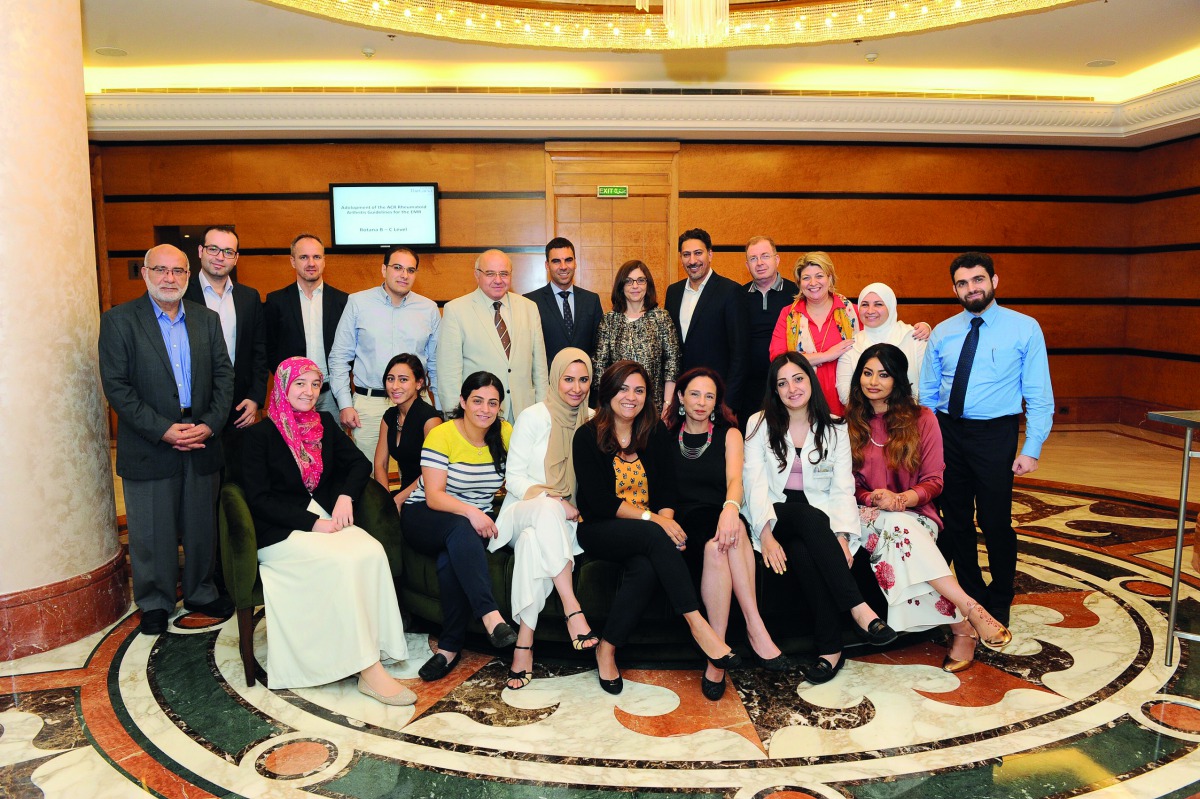 Distinguished rheumatologists from across the Eastern Mediterranean region posing for group picture in Doha. 