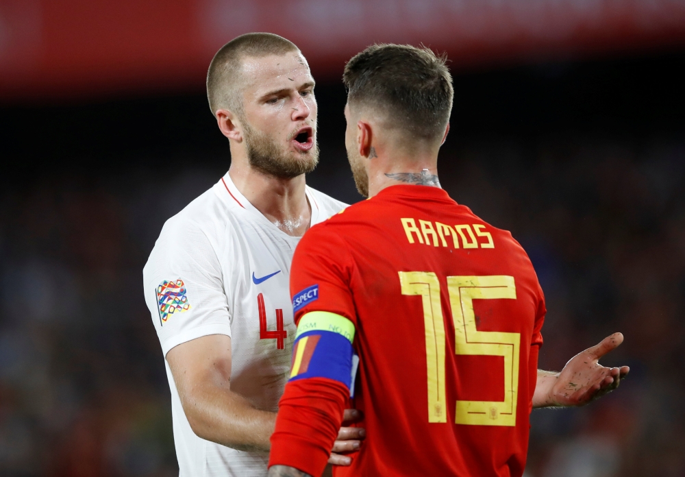 England's Eric Dier (L) talks to Spain's Sergio Ramos, October 15, 2018.  Action Images via Reuters/Carl Recine