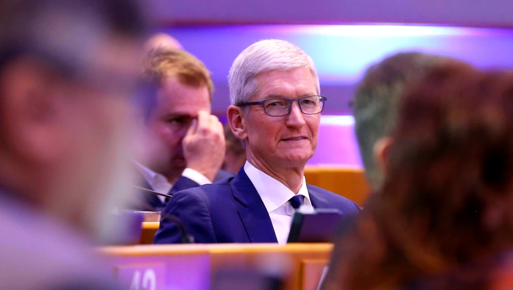Tim Cook (C), CEO of Apple Inc gestures during the Debating Ethics event at the European Parliament in Brussels, Belgium on October 24, 2018. ( Dursun Aydemir - Anadolu Agency )