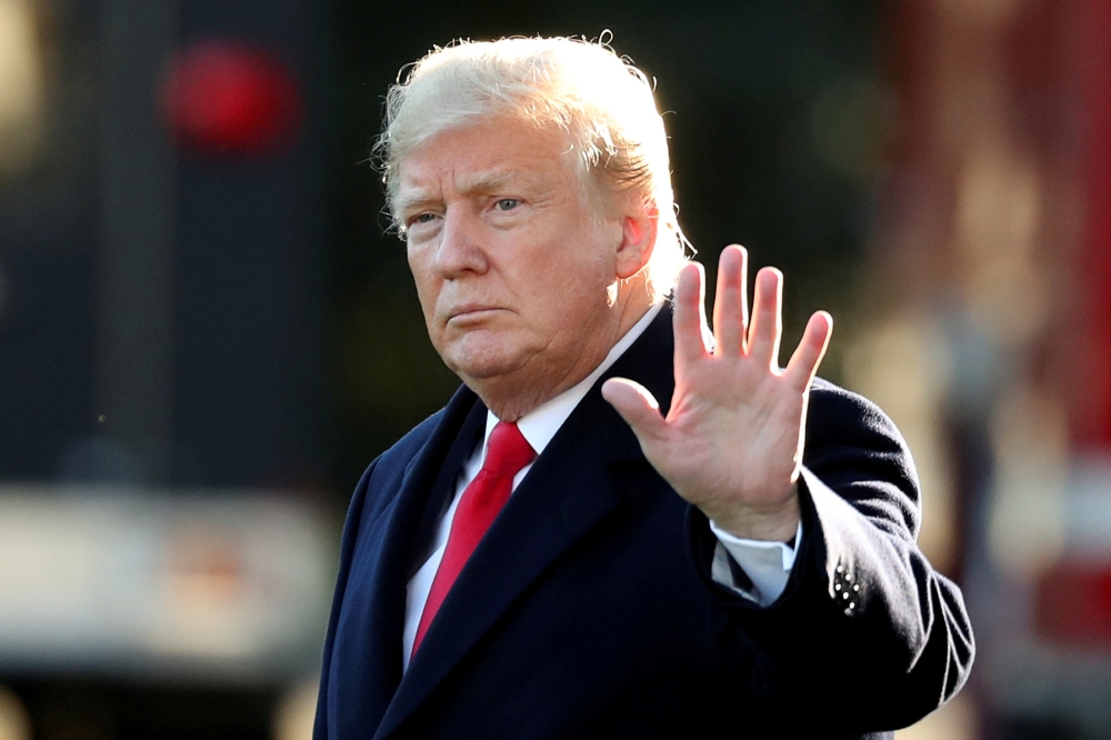 U.S. President Donald Trump waves prior to departing on a trip to Wisconsin from the White House in Washington, U.S., October 24, 2018. (Reuters / Cathal McNaughton)