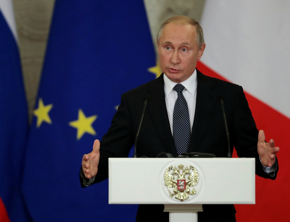 Russian President Vladimir Putin speaks during a joint news conference with Italian Prime Minister Giuseppe Conte following their talks at the Kremlin in Moscow, Russia October 24, 2018. Sergei Chirikov/Pool via REUTERS