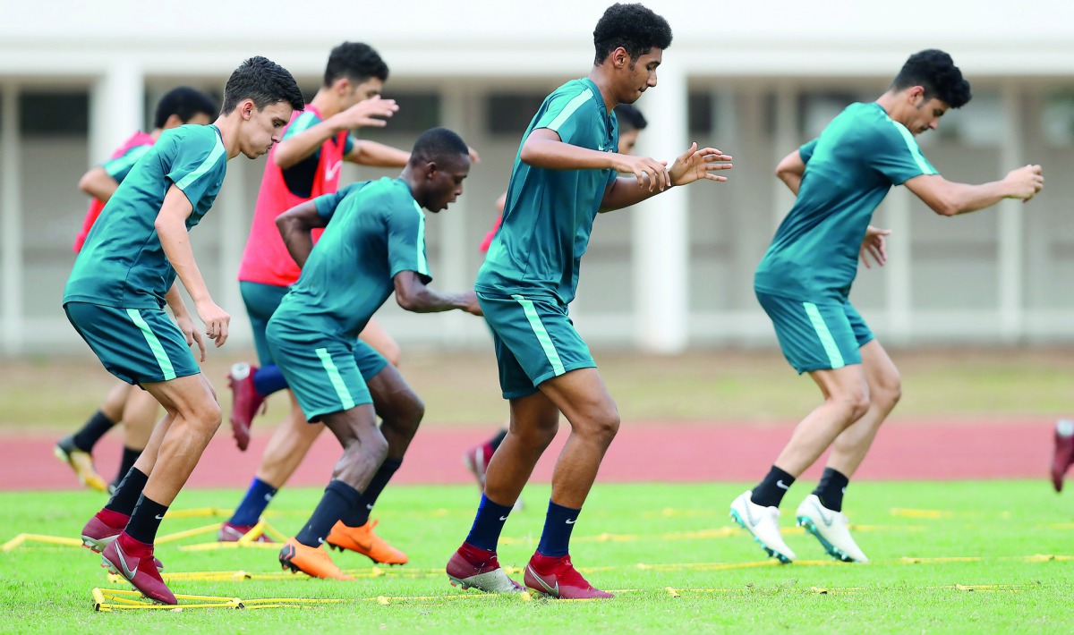 Qatari under-19 players in action during a practice session in Jakarta, Indonesia yesterday, ahead of their AFC U-19 quarter-final match against Thailand which will be played today.