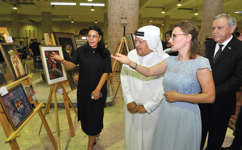 Sheikh Faisal bin Qassim Al Thani (second left) and Russian Ambassador to Qatar Nurmakhmad Kholov (right) touring the art exhibition which is a highlight of the Russian Festival held recently at FBQ Museum. Pic: Salim Matramkot/The Peninsula