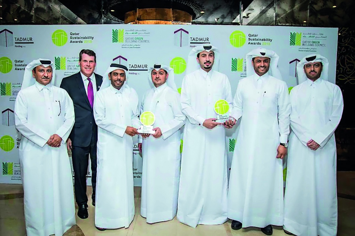 Officials with the awards.