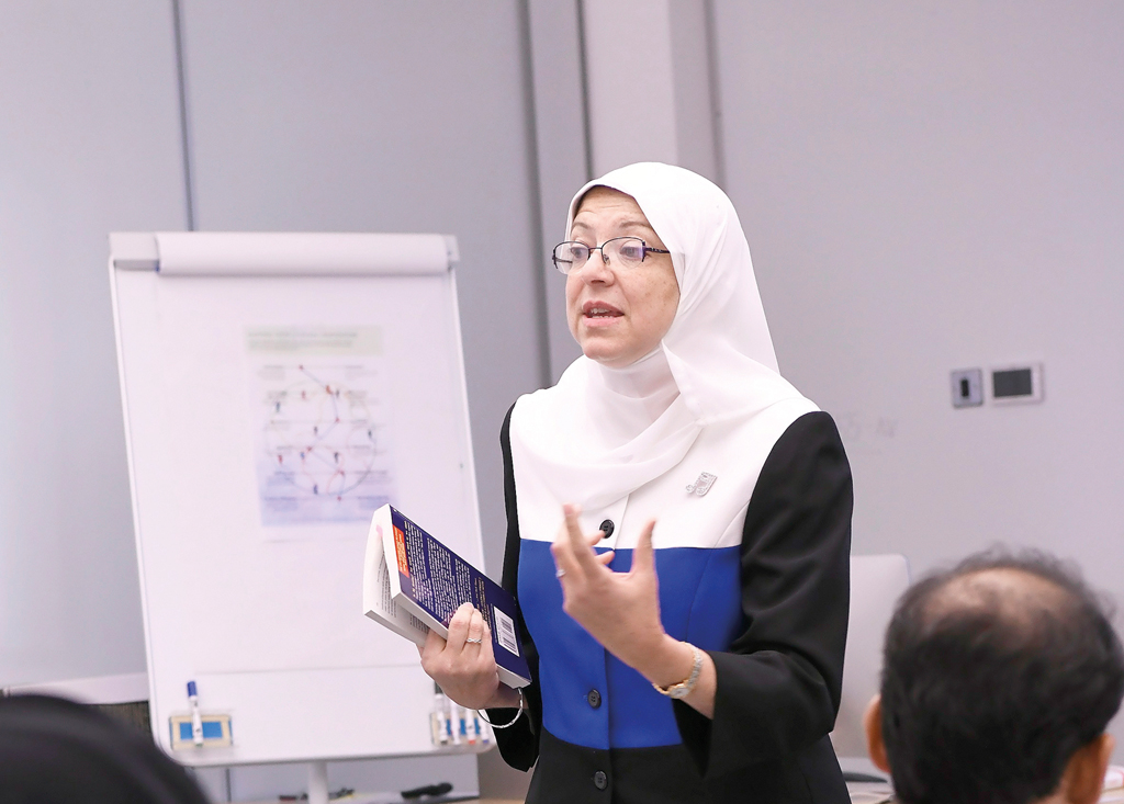 Maha Elnashar of WCM-Q leading a session on a course designed to help health professionals develop enhanced emotional intelligence skills.