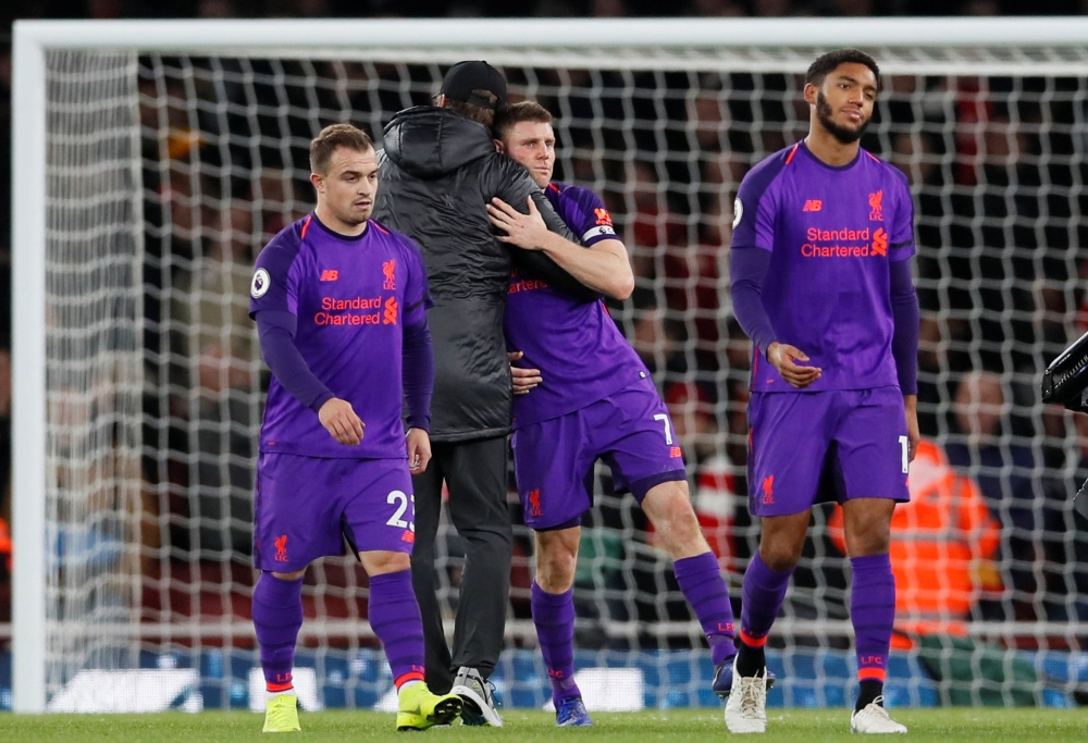  Liverpool's Xherdan Shaqiri, manager Juergen Klopp, James Milner and Joe Gomez after the match REUTERS/David Klein 