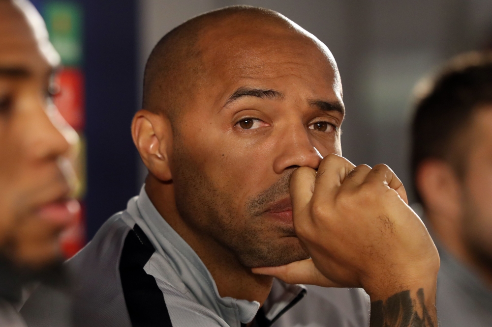 Monaco's French coach Thierry Henry looks on as he addresses a press conference on the eve of the UEFA Champions League first round football match between AS Monaco and Bruges in Monaco, on November 5, 2018. / AFP / VALERY HACHE